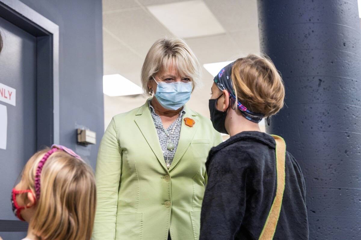 Provincial health officer Dr. Bonnie Henry meets with some of the first children under 12 to receive COVID-19 vaccines at a clinic in Victoria, Nov. 29, 2021. (B.C. government photo)