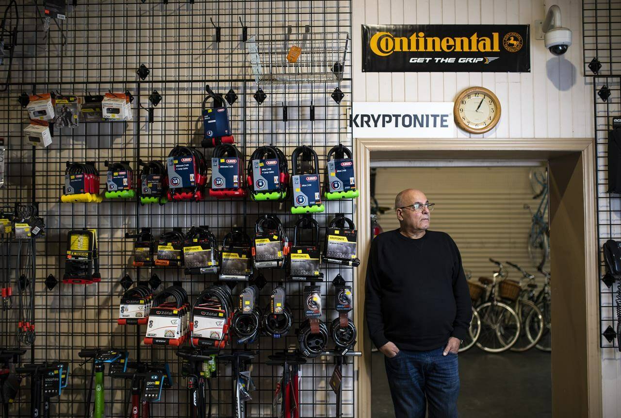 Rami Aroosi, who has run Foster’s Sports Centre for three decades, stands in his bike shop in Ottawa, on Friday, Dec. 10, 2021. For much of the past 21 months, Rami Aroosi has struggled to procure enough bikes to fill the racks of his downtown Ottawa cycle shop. THE CANADIAN PRESS/Justin Tang