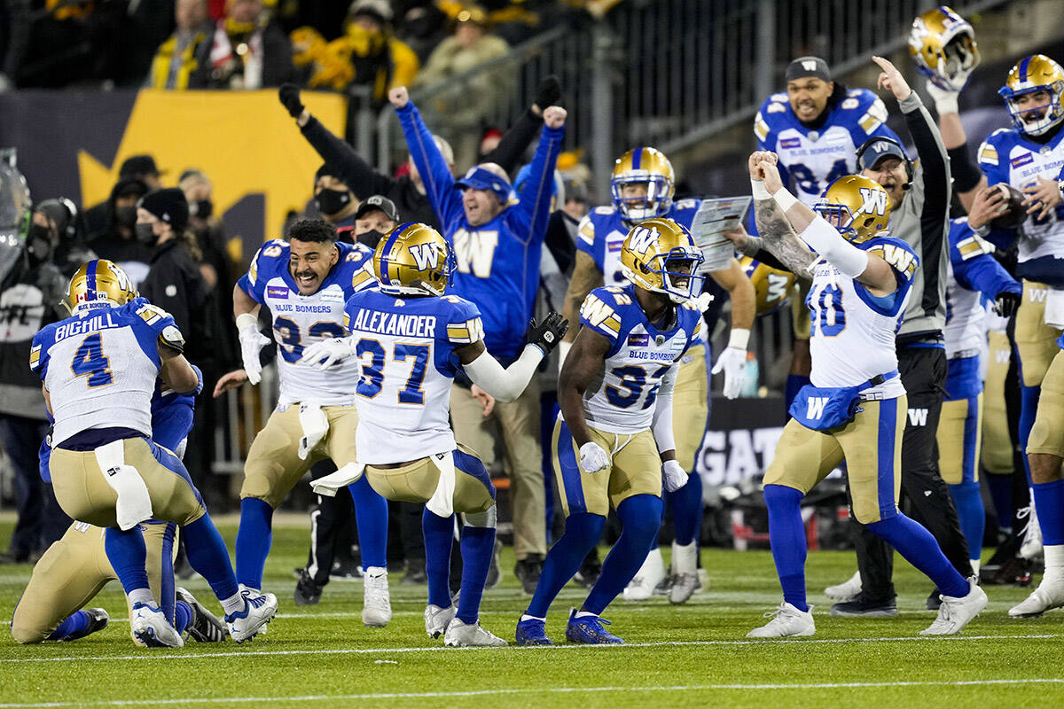 The Winnipeg Blue Bombers celebrate their victory against the Hamilton Tiger-Cats in the 108th CFL Grey Cup in Hamilton, Ont., on Sunday, December 12, 2021. THE CANADIAN PRESS/Ryan Remiorz