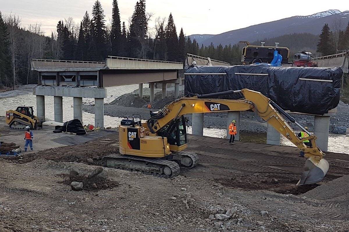 Repair work at Bottletop Bridge on the Coquihalla Highway, Dec. 7, 2021. Repairs to dozens of highway sites in B.C.’s southern Interior will be ongoing through next year and beyond, at costs not yet estimated. (B.C. Ministry of Transportation photo)
