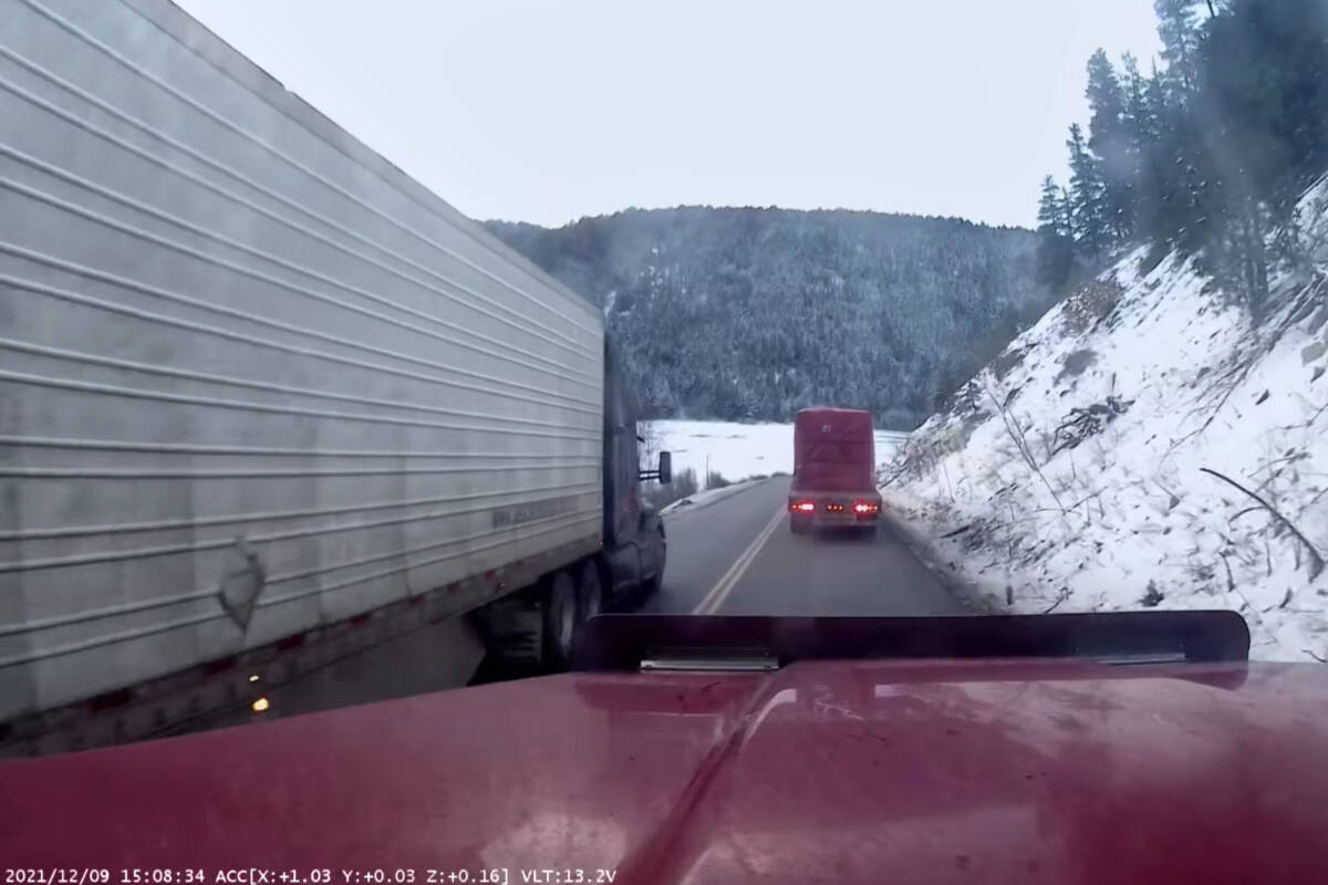 The company behind the truck caught on dashcam passing on a double yellow on Highway 5A on Dec. 9 has had their licence suspended according to Transportation Minister Rob Fleming. (Jim Beckett - Facebook)