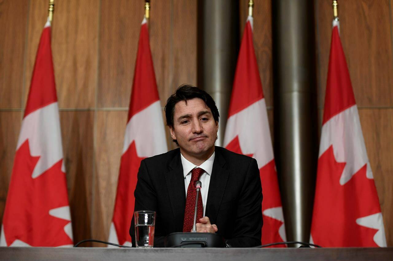 Prime Minister Justin Trudeau listens to questions in Ottawa, on Monday, Dec. 13, 2021. THE CANADIAN PRESS/Justin Tang