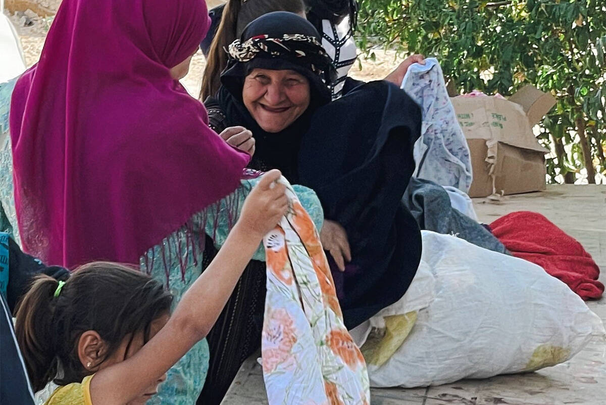 A 40-foot shipping container stuffed to the brim brings smiles to faces in a Syrian refugee camp in Lebanon after surviving a massive explosion in the Port of Beirut. (Compassionate Resource Warehouse/Facebook)