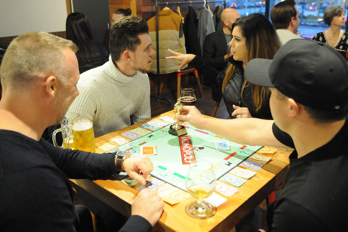 Organized by realtor David Smith, the third annual Realtor Monopoly fundraiser night held at Trading Post Brewery in Langley. What is the most expensive property on the monopoly board? (Black Press file photo)