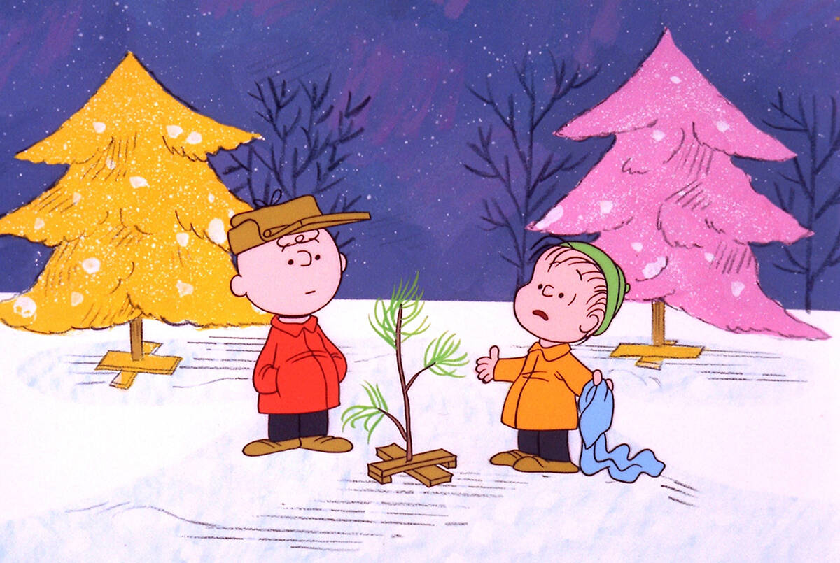 In this promotional image provided by ABC TV, Charlie Brown and Linus appear in a scene from “A Charlie Brown Christmas, which ABC will air Dec. 6 and Dec. 16 to commemorate the classic animated cartoon’s 40th anniversary. Do you know when this holiday special first aired? (AP Photo/ABC, 1965 United Feature Syndicate Inc.,File)