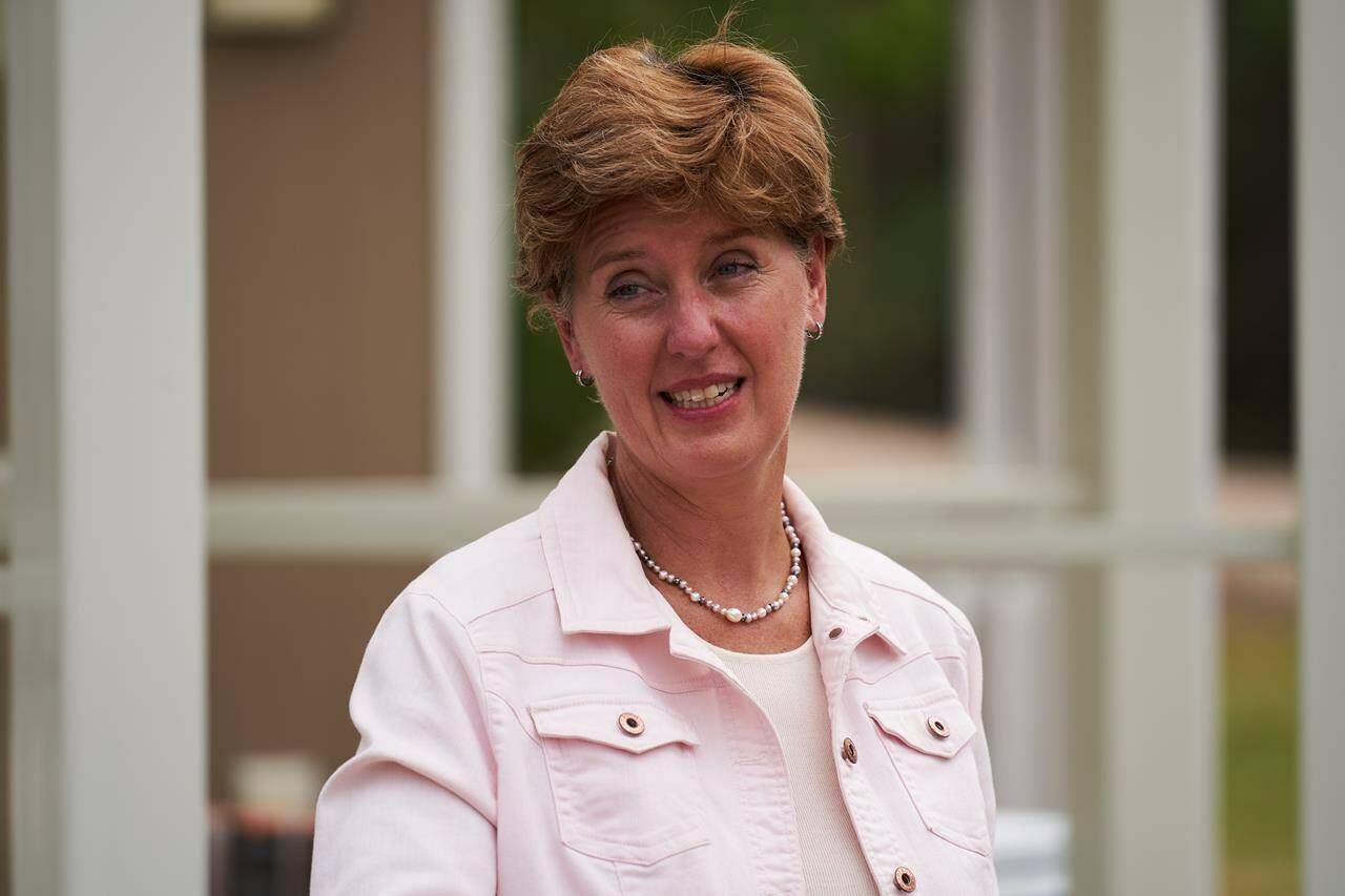 Federal Agriculture Minister Marie-Claude Bibeau tours a grain farm in the drought-stricken Interlake Region of Manitoba on Thursday July 22, 2021. THE CANADIAN PRESS/David Lipnowski