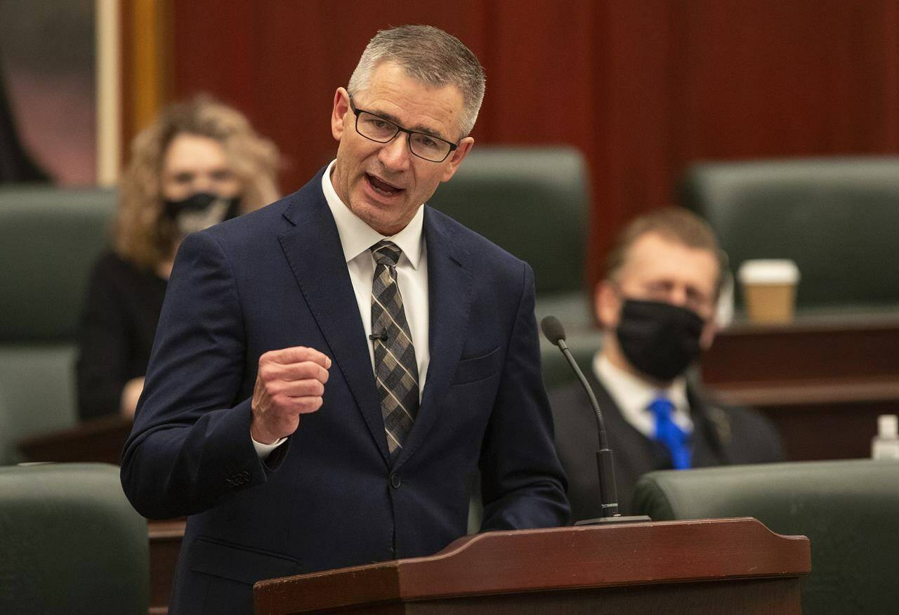 Alberta Finance Minister Travis Toews delivers the 2021 budget in Edmonton on Thursday, Feb. 25, 2021. An Alberta nurses’ union is asking members to sign off on a proposed four-year collective agreement that amounts to pay increases of 4.25 per cent. THE CANADIAN PRESS/Jason Franson