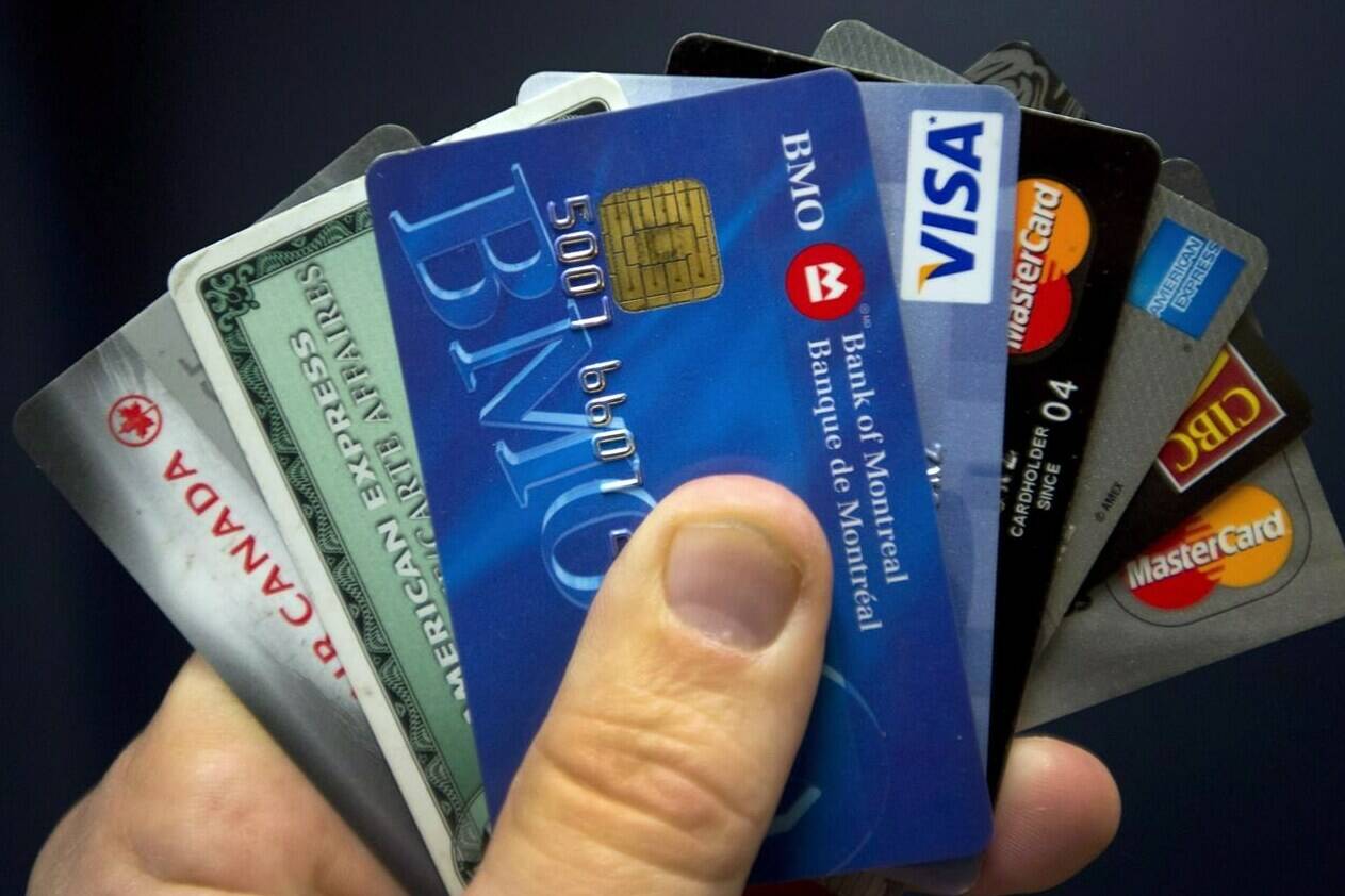 Credit cards are displayed in Montreal, Wednesday, December 12, 2012. THE CANADIAN PRESS/Ryan Remiorz