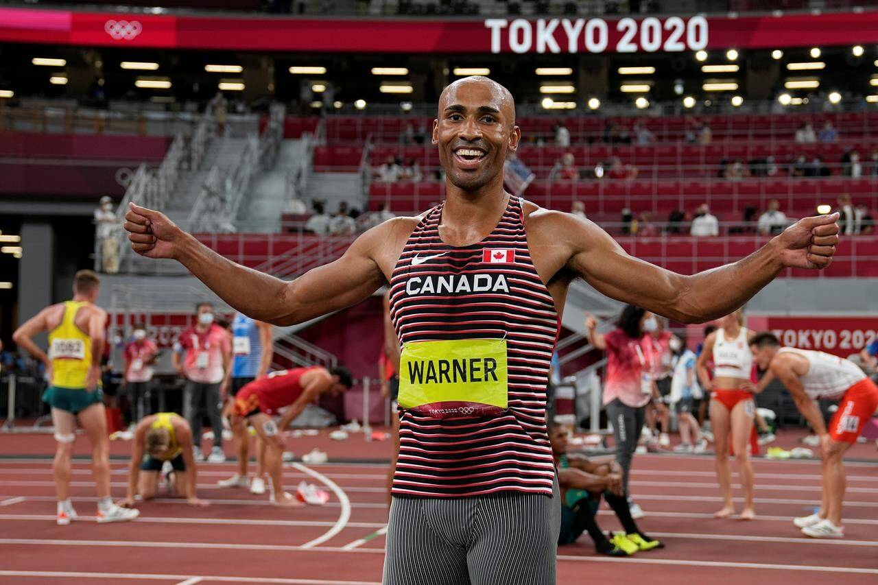 Damian Warner, of Canada, celebrates after he won the gold medal for the decathlon at the 2020 Summer Olympics, Thursday, Aug. 5, 2021, in Tokyo. THE CANADIAN PRESS/AP-David J. Phillip
