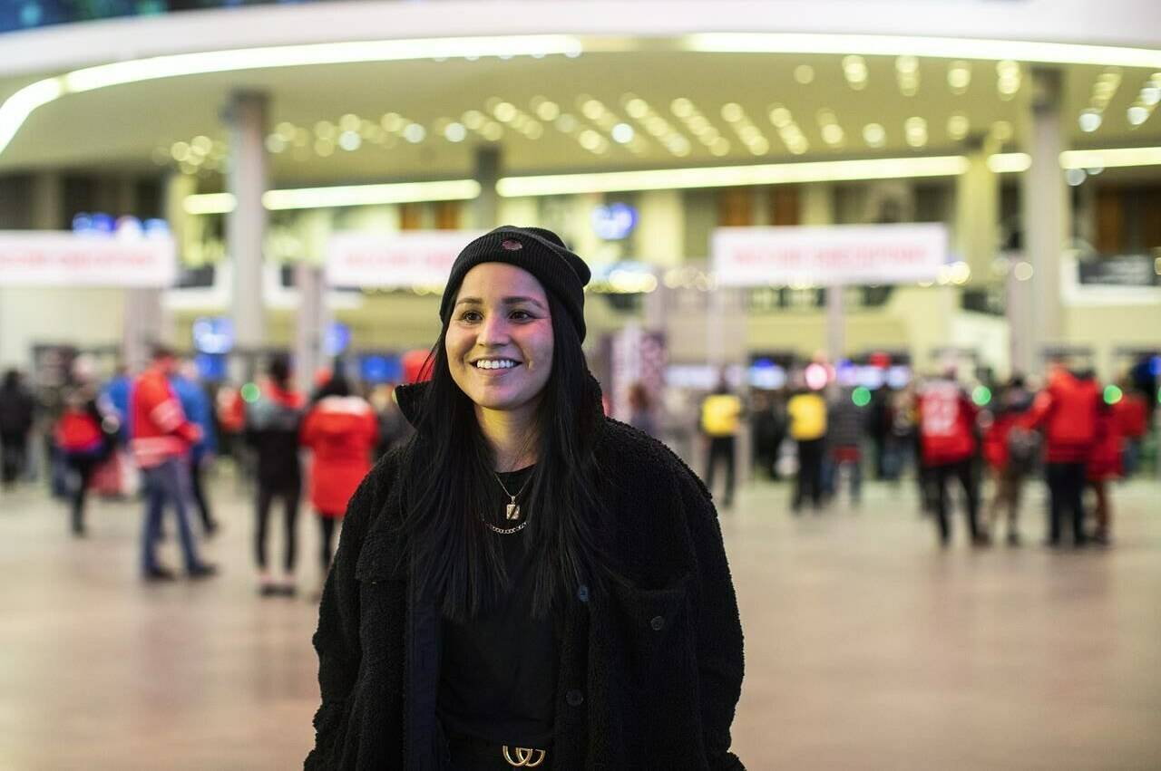 Brigette Lacquette poses for a photo at the IIHF World Junior Hockey Championship in Edmonton on Tuesday, December 28, 2021. Lacquette is the first Indigenous woman to scout for an NHL team. She works for the Chicago Blackhawks. THE CANADIAN PRESS/Jason Franson