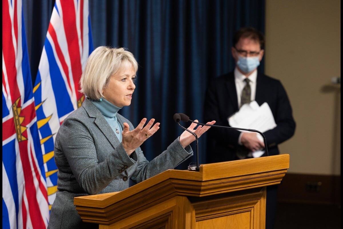 Provincial health officer Dr. Bonnie Henry and Health Minister Adrian Dix outline holiday season gathering restrictions to reduce COVID-19 infections, B.C. legislature, Dec. 21, 2021. (B.C. government photo)