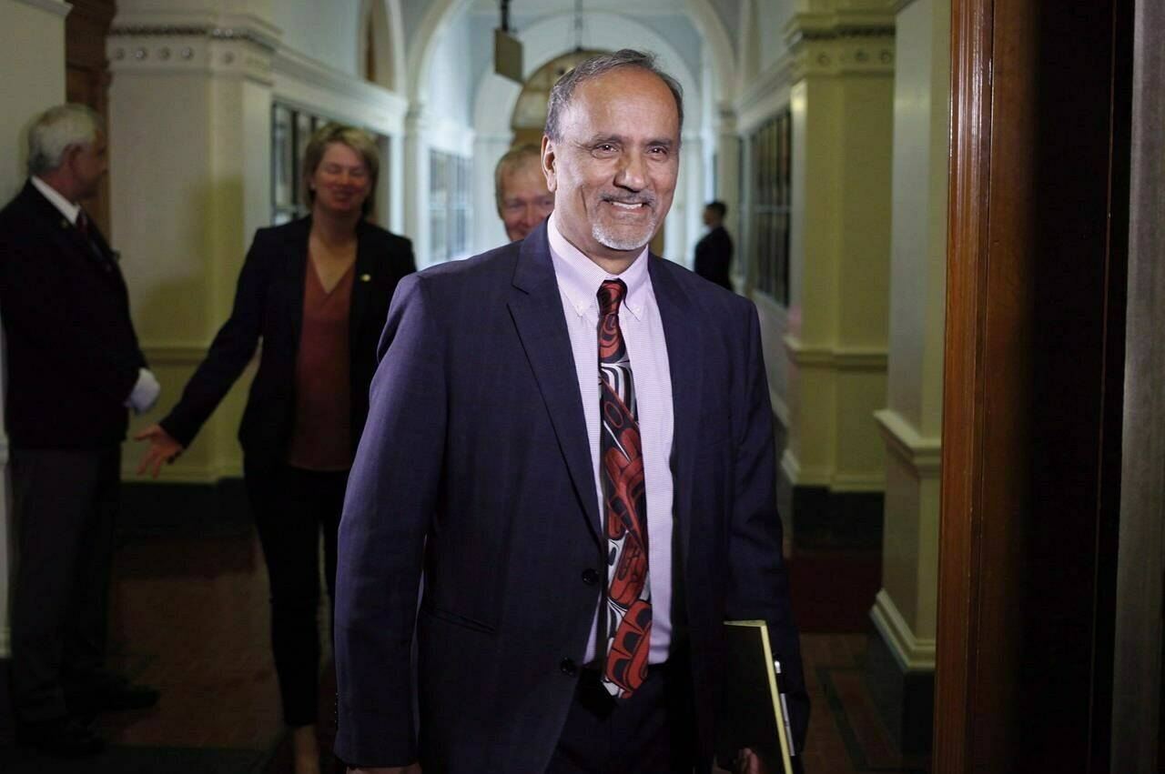 Harry Bains arrives at the B.C. legislature in Victoria, June 26, 2017. Workers in British Columbia are now eligible for five paid sick days. THE CANADIAN PRESS/Chad Hipolito