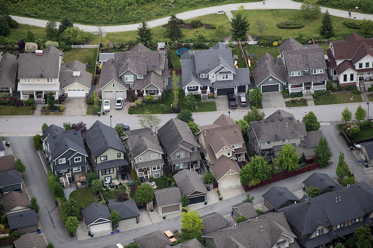 Houses are seen in an aerial view in Langley, B.C., on Wednesday May 16, 2018. Home sales in Metro Vancouver remain well below the 10 year average for the region but sellers continue to hold the upper hand as the Real Estate Board of Greater Vancouver says demand for properties is steady but buyers have little to choose from. THE CANADIAN PRESS/Darryl Dyck