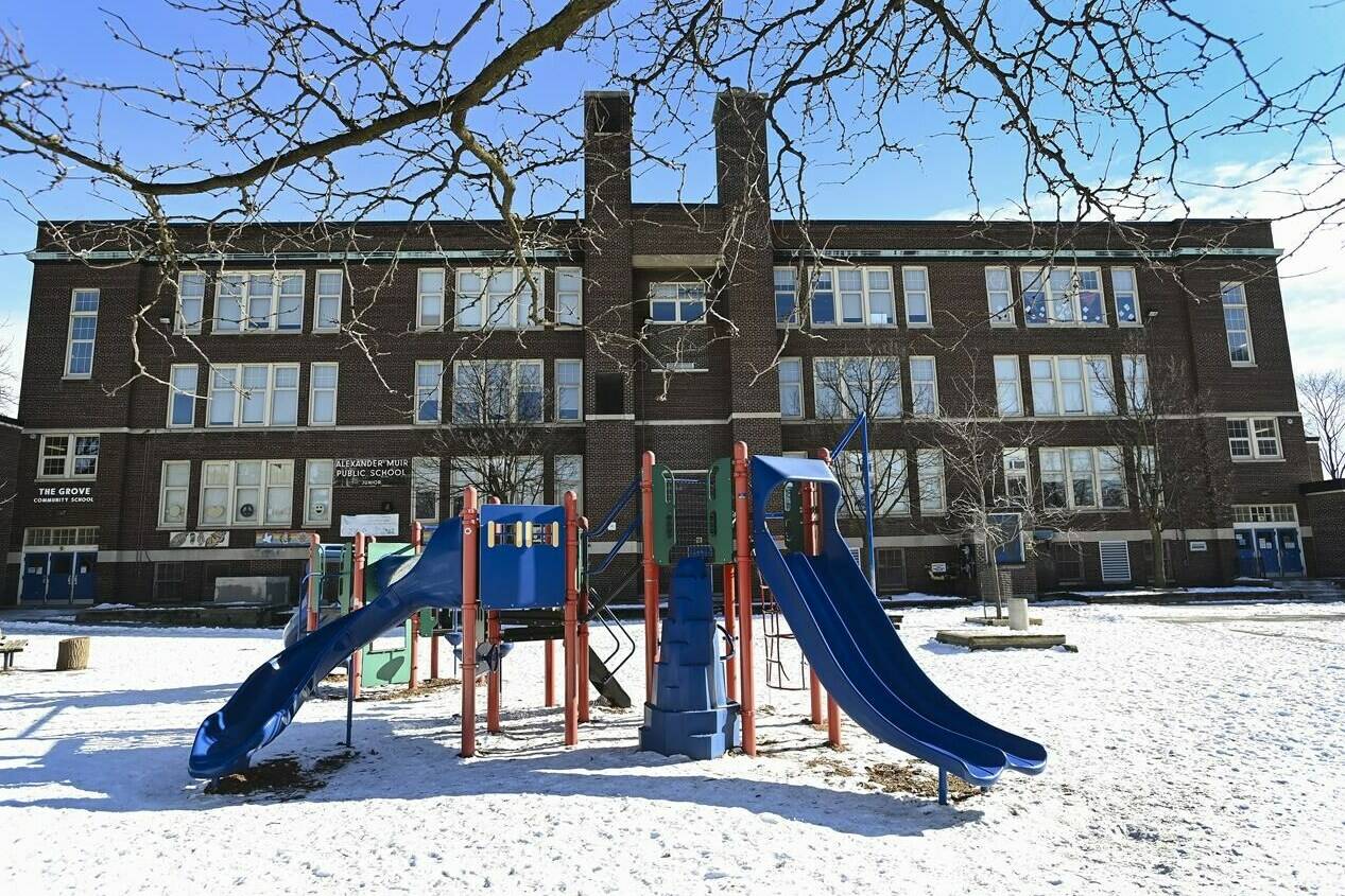 An empty playground in a schoolyard is shown during the COVID-19 pandemic in Toronto on Wednesday, Feb. 3, 2021. Ontario is joining the list of provinces delaying in-person schooling in the new year, as COVID-19 cases and hospitalizations continue to rise across the country. THE CANADIAN PRESS/Nathan Denette
