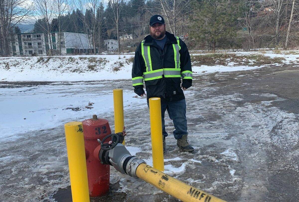 One of the projects costing Princeton is the drilling of new water lines under the Tulameen River. In the photo above, Mayor Spencer Coyne displays the municipality’s ingenuity in using a series of fire hoses to carry water to the north side of town, before the province approved a more permanent solution.