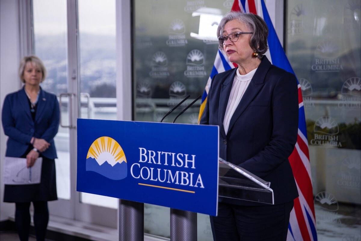 Provincial health officer Dr. Bonnie Henry and B.C. Education Minister Jennifer Whiteside speak about COVID-19 measures in B.C. schools at the Vancouver cabinet offices, Dec. 29, 2021. (B.C. government photo)