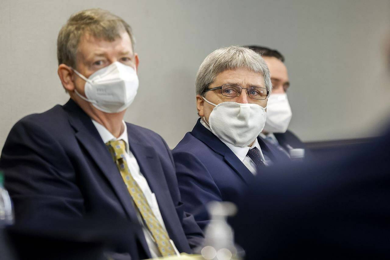 William “Roddie” Bryan, center, listens to motions by members of the defense during his sentencing along with Greg McMichael, and Travis McMichael, in the Glynn County Courthouse, Friday, Dec. 7, 2022, in Brunswick, Ga. The three found guilty in the February 2020 slaying of 25-year-old Ahmaud Arbery. (AP Photo/Stephen B. Morton, Pool)