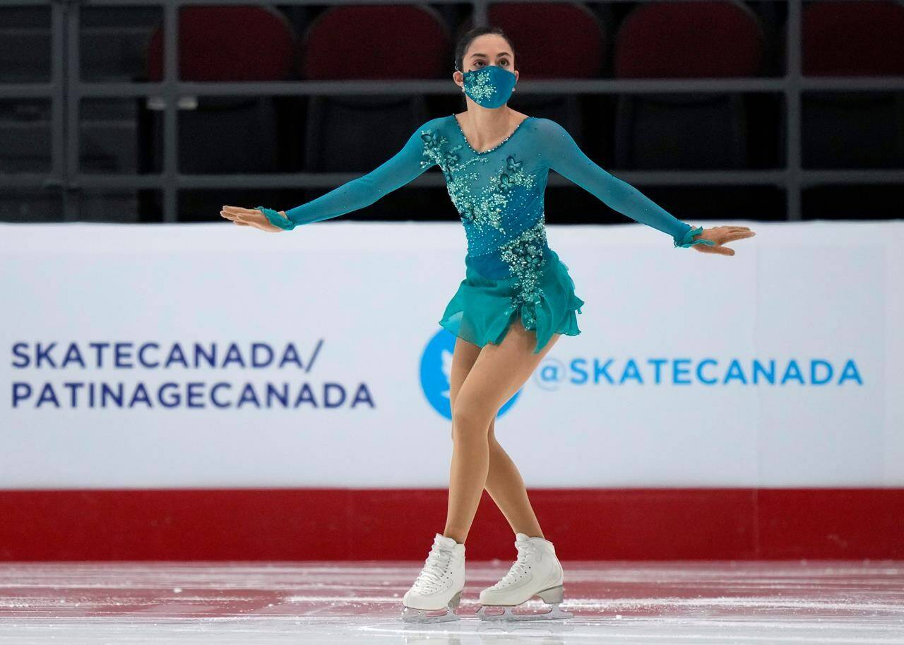 Madeline Schizas skates during the warm up for the senior women’s free program at the National Skating Championships, in Ottawa, Saturday, Jan. 8, 2022. Schizas won the women’s singles title at the Canadian figure skating championships, all but clinching her trip to the Beijing Olympics. THE CANADIAN PRESS/Adrian Wyld
