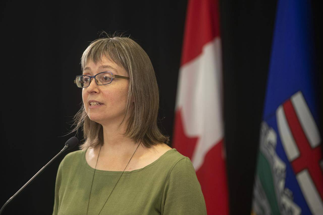Alberta chief medical officer of health, Dr. Deena Hinshaw, provides a COVID-19 update in Edmonton on Friday, Sept. 3, 2021. Alberta is reducing availability to COVID-19 testing as it deals with a rising wave of cases brought on by the Omicron variant. THE CANADIAN PRESS/Jason Franson