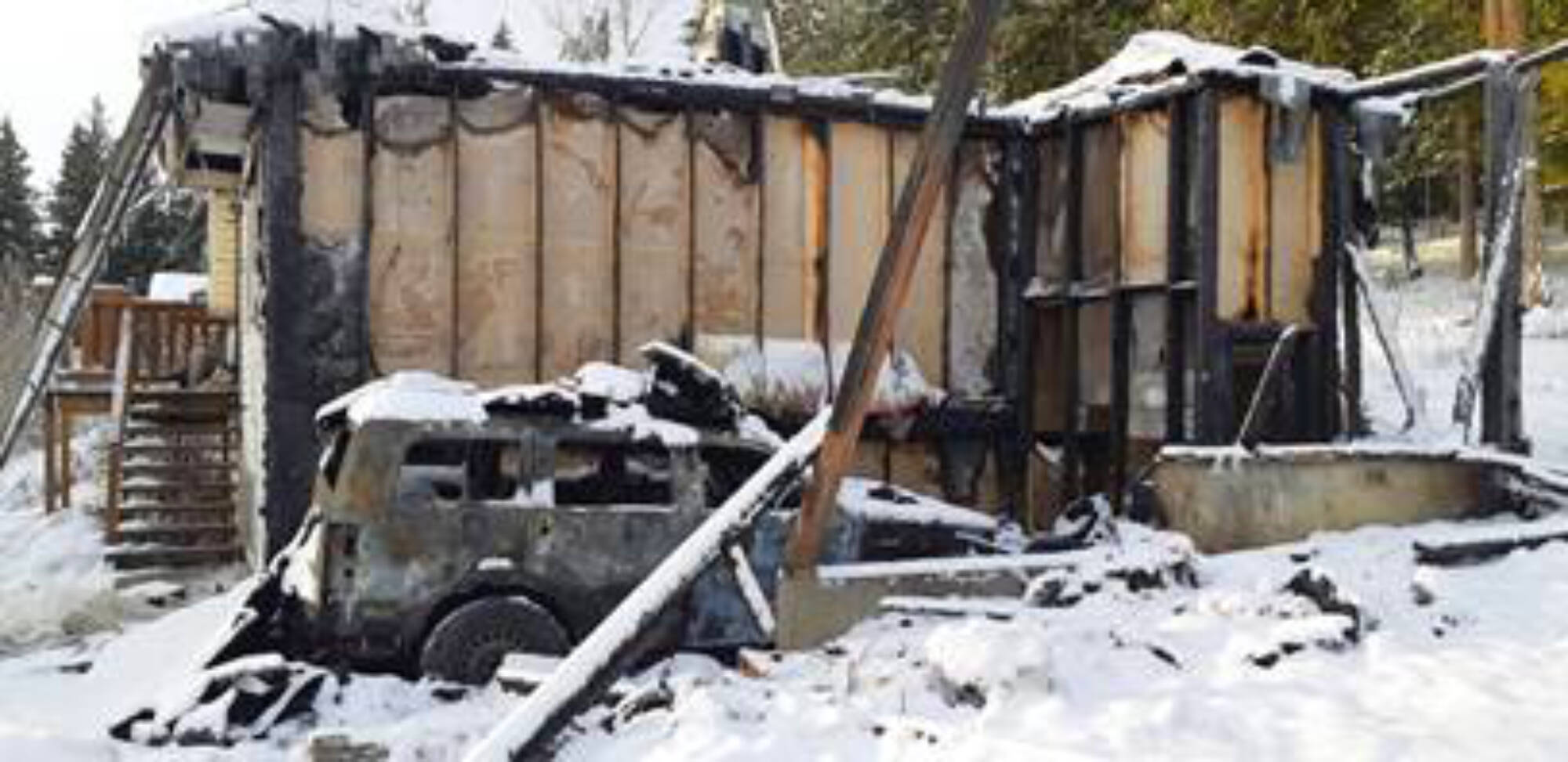 Bonnie Thomas and her son Darcy Andrew escaped from their burning home west of Salmon Arm on Switzmalph land about 3 a.m. Saturday, Jan. 8 after someone was seen running away from the house. (Contributed)