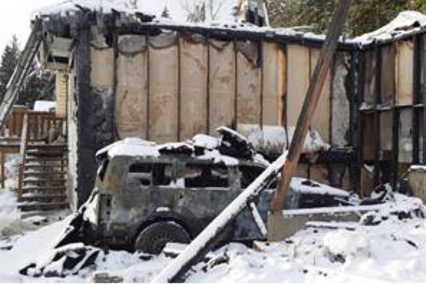Bonnie Thomas and her son Darcy Andrew escaped from their burning home west of Salmon Arm on Switzmalph land about 3 a.m. Saturday, Jan. 8 after someone was seen running away from the house. (Contributed)