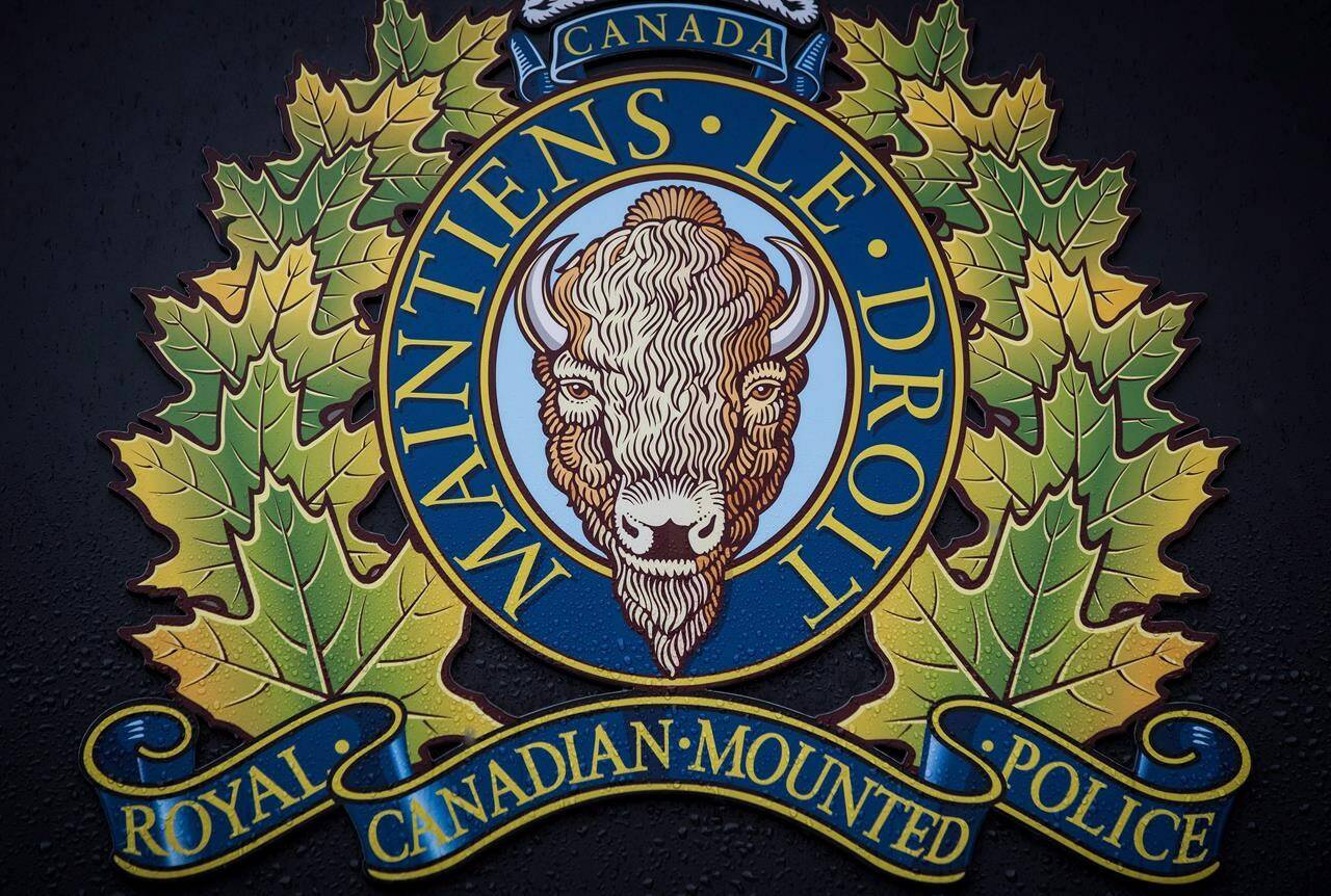 The RCMP logo is seen outside Royal Canadian Mounted Police “E” Division Headquarters, in Surrey, B.C., on Friday April 13, 2018. The head of the RCMP officers’ union says it’s time for a basic look at how the national police force can best serve communities across the country.THE CANADIAN PRESS/Darryl Dyck