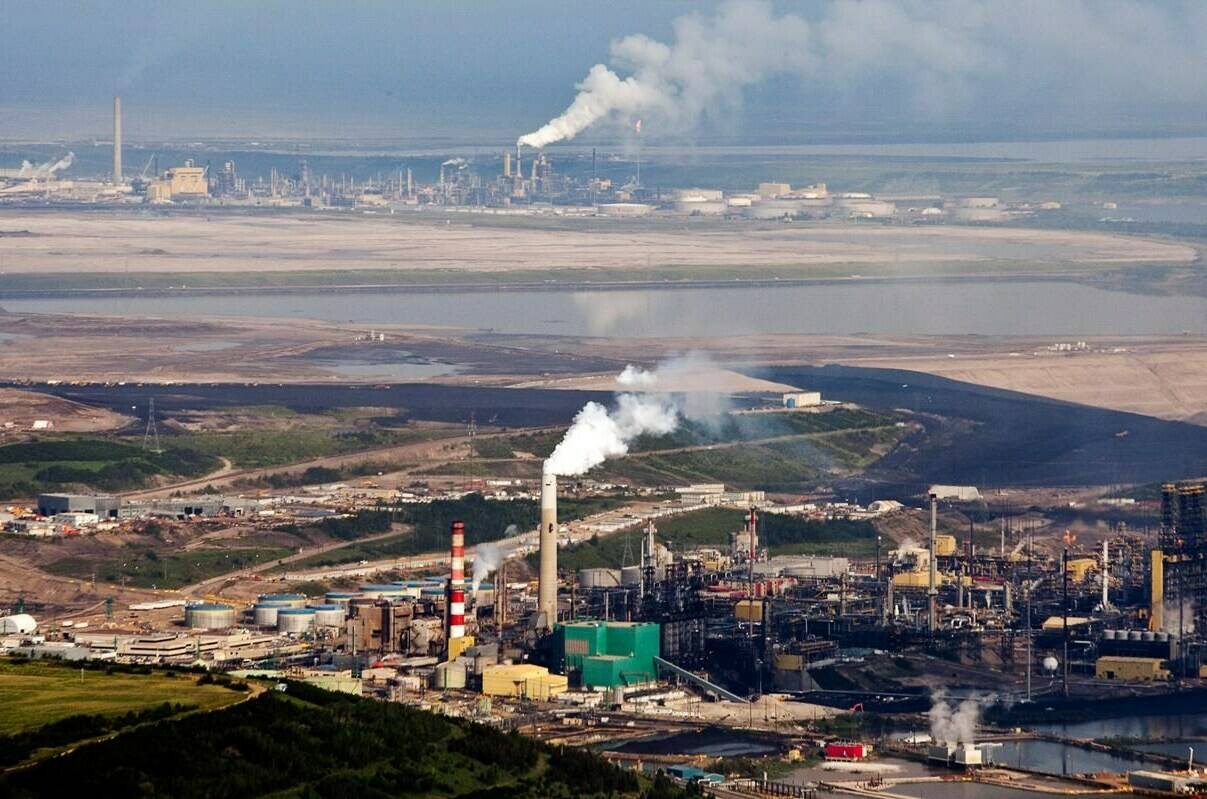 The Suncor oil sands facility seen from a helicopter near Fort McMurray, Alta., Tuesday, July 10, 2012. THE CANADIAN PRESS/Jeff McIntosh
