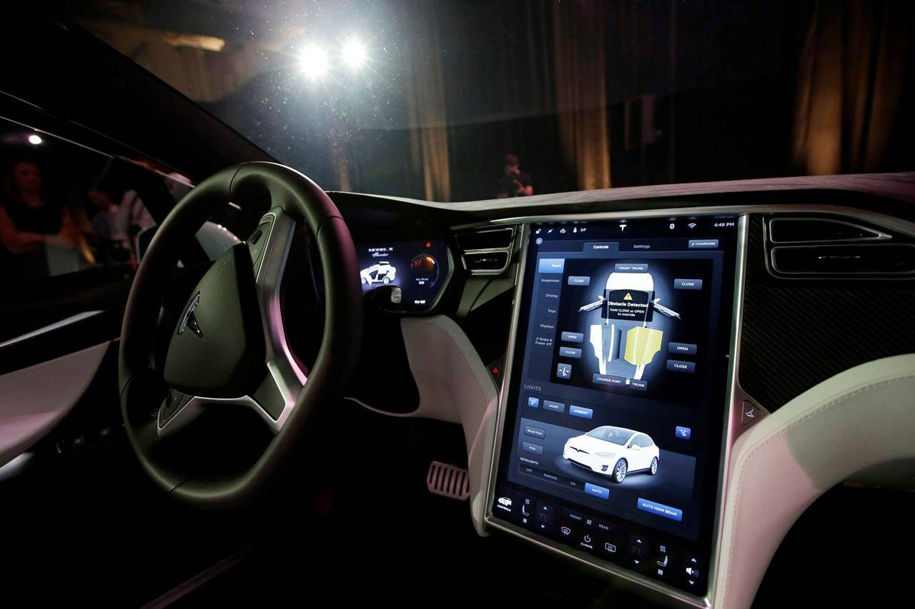 The dashboard of the Tesla Model X car is shown at the company’s headquarters Tuesday, Sept. 29, 2015, in Fremont, Calif. THE CANADIAN PRESS/AP-Marcio Jose Sanchez