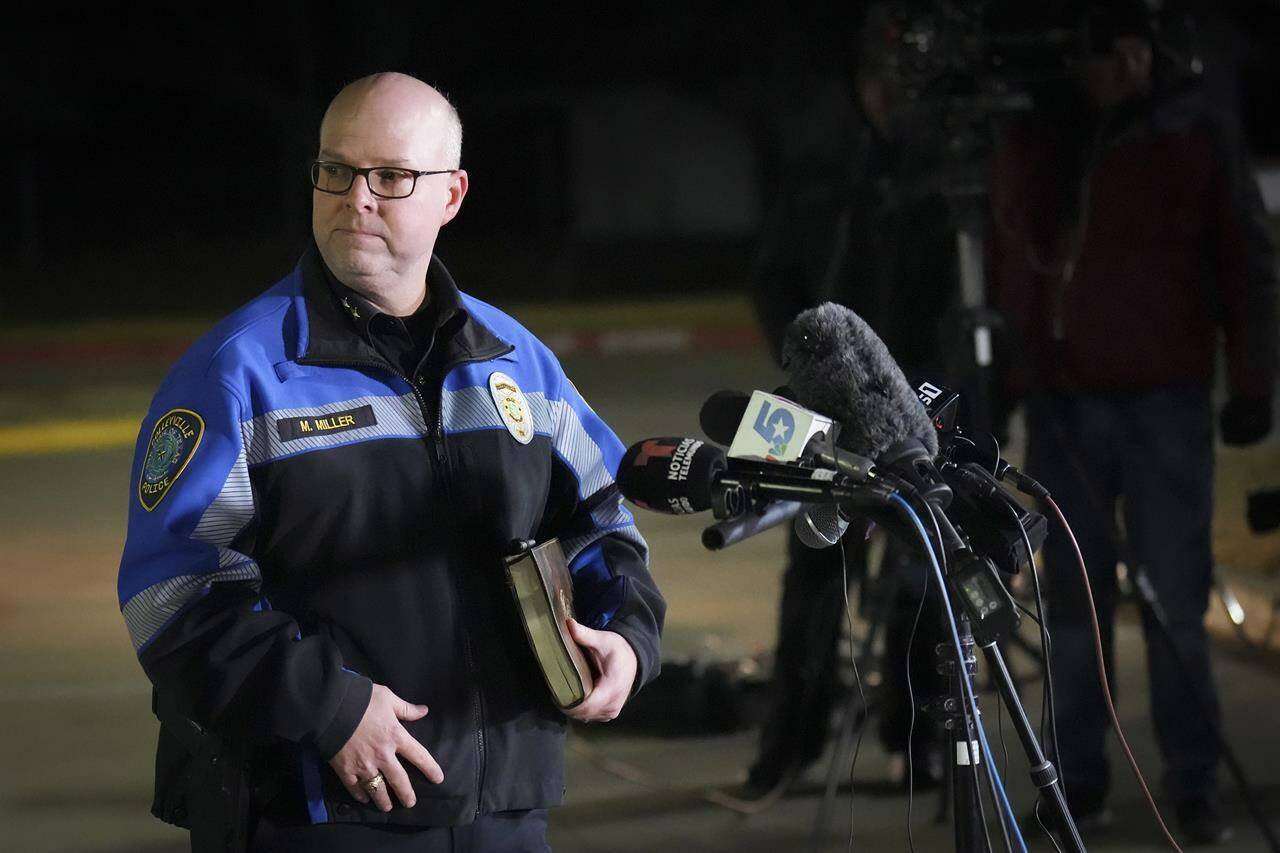 Colleyville police Chief Michael Miller addresses reporters in a nearby parking lot after the conclusion of a SWAT operation at Congregation Beth Israel synagogue on Saturday, Jan. 15, 2022, in Colleyville, Texas. All four people taken hostage inside the synagogue during a morning service were safe Saturday night after an hours-long standoff, authorities said. (Smiley N. Pool/The Dallas Morning News via AP)