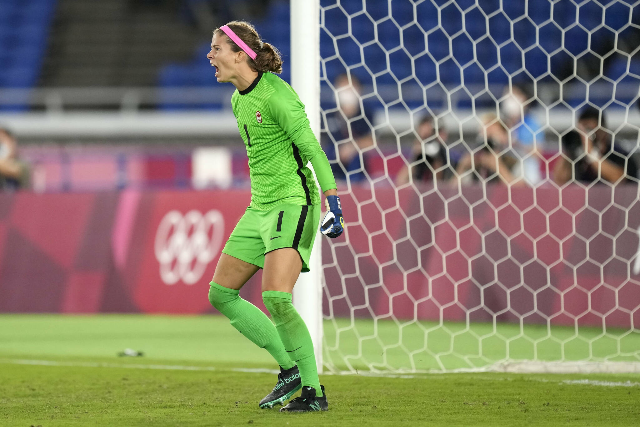 Canada’s goalkeeper Stephanie Labbe reacts in a penalty shootout during the women’s final soccer match against Sweden at the 2020 Summer Olympics, Saturday, Aug. 7, 2021, in Yokohama, Japan. (AP Photo/Andre Penner)