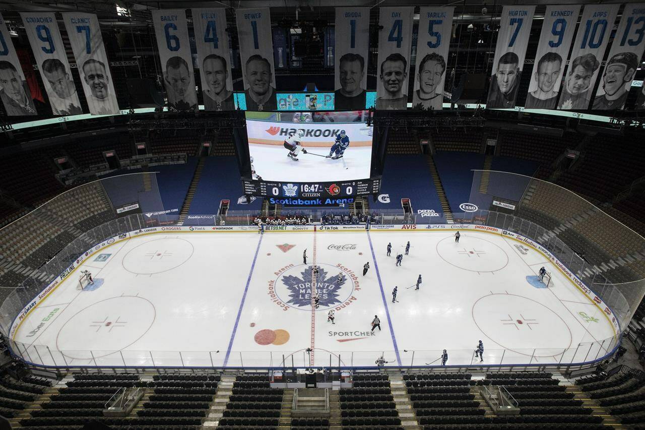 The Toronto Maple Leafs take on the Ottawa Senators in a nearly empty Scotiabank Arena during NHL hockey action in Toronto, Saturday, Jan. 1, 2022. THE CANADIAN PRESS/Chris Young