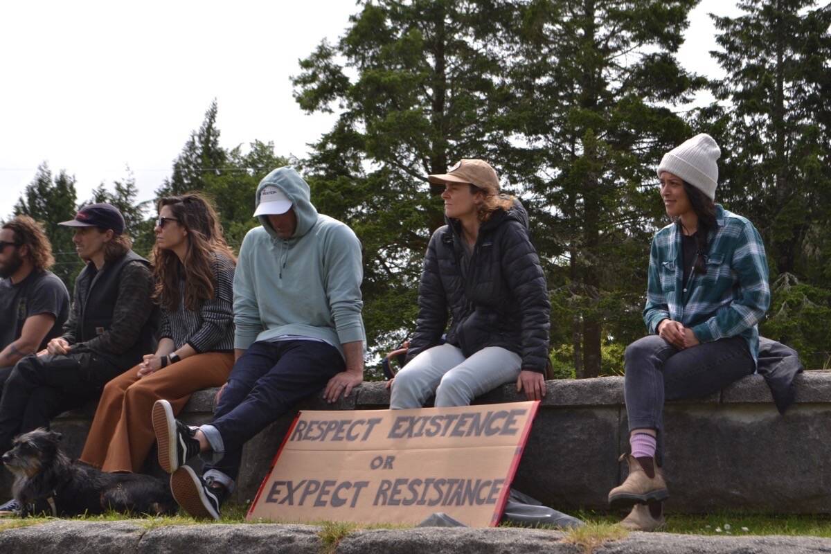 Professional snowboarder Marie-France Roy, centre, listens to speakers at a solidarity for Fairy Creek rally in Tofino in June 2021. (Westerly file photo)