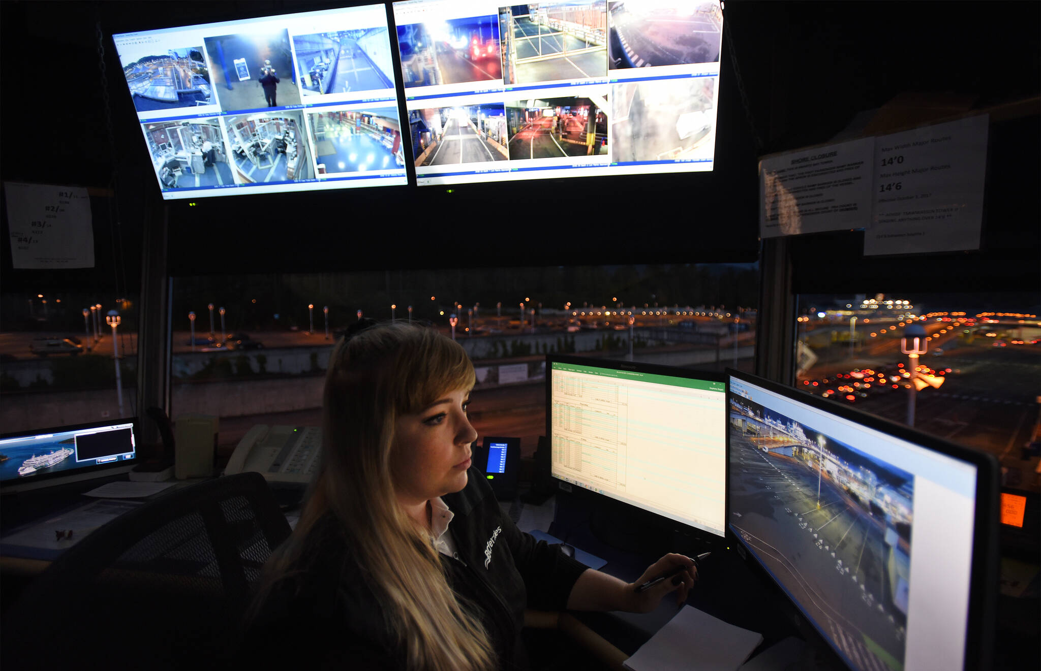 A tower controller keeps an eye on her screens and vehicle traffic at the Swartz Bay BC Ferries terminal. (Black Press Media file photo)
