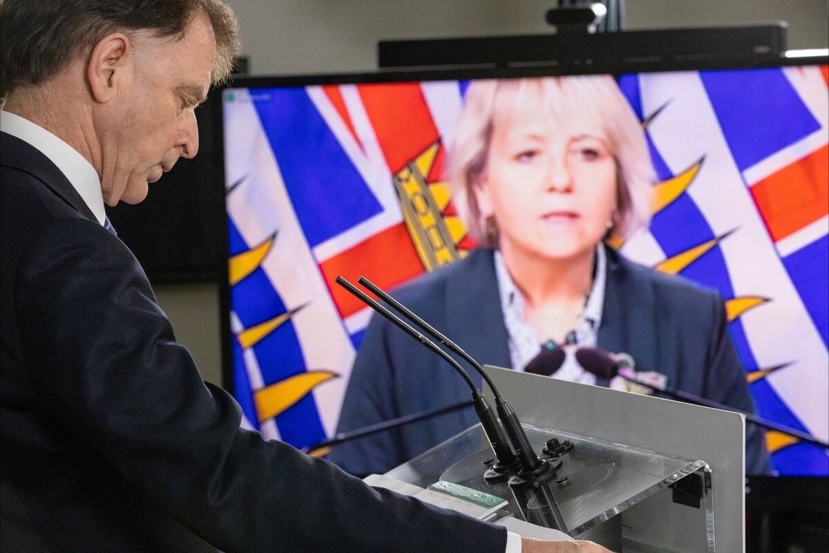 As B.C. nears two years since the first COVID-19 case was confirmed, Health Minister Adrian Dix in Vancouver and Dr. Bonnie Henry in Victoria update pandemic conditions, Jan. 14, 2022. (B.C. government photo)