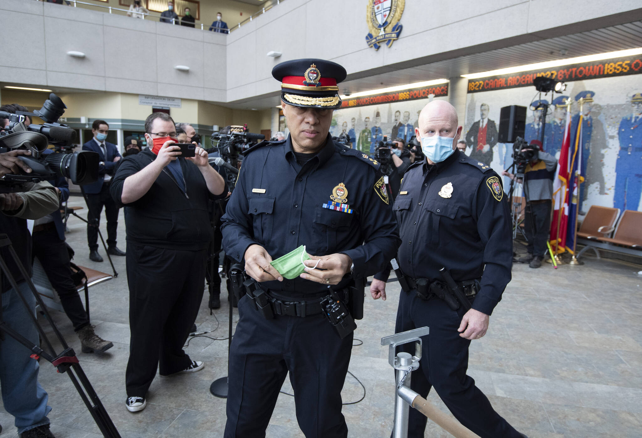 Ottawa Police Chief Peter Sloly leaves after speaking at a news conference on updated enforcement measures as a protest against COVID-19 restrictions continues into its second week, in Ottawa, on Friday, Feb. 4, 2022. THE CANADIAN PRESS/Justin Tang