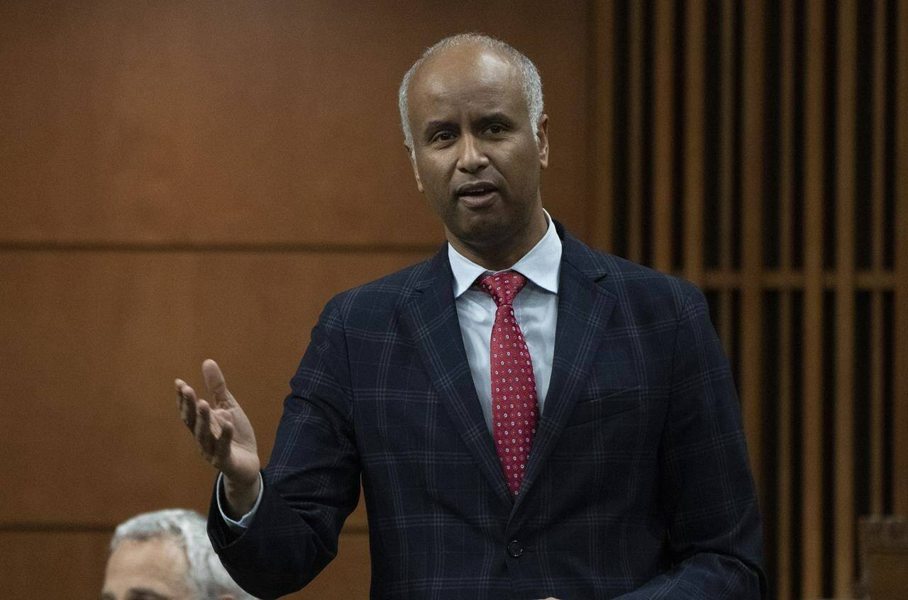 Housing and Diversity and Inclusion Minister Ahmed Hussen rises during Question Period, in Ottawa, Thursday, Feb. 3, 2022. THE CANADIAN PRESS/Adrian Wyld