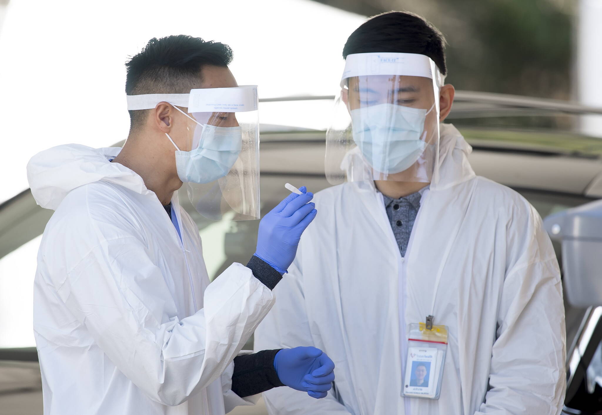 Staff at a drive-through COVID-19 testing facility in Burnaby, B.C., Monday, April 6, 2020. THE CANADIAN PRESS/Jonathan Hayward