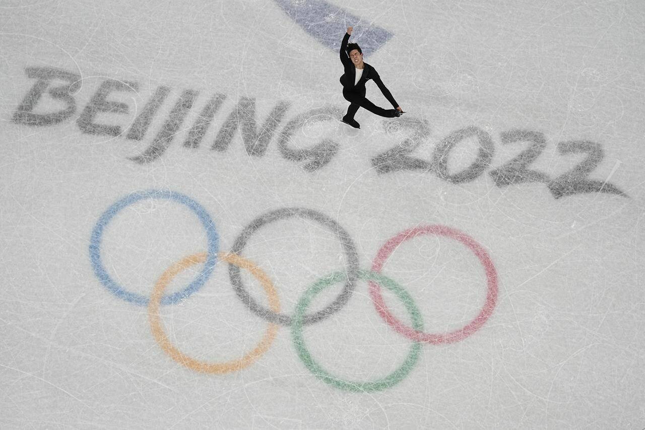 Nathan Chen, of the United States, competes during the men's short program figure skating competition at the 2022 Winter Olympics, Tuesday, Feb. 8, 2022, in Beijing. (AP Photo/Jeff Roberson)