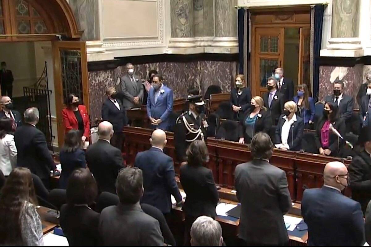 B.C. Lt. Governor Janet Austin (red jacket) enters the legislature to present the government’s throne speech, Feb. 8, 2022. (Hansard TV)