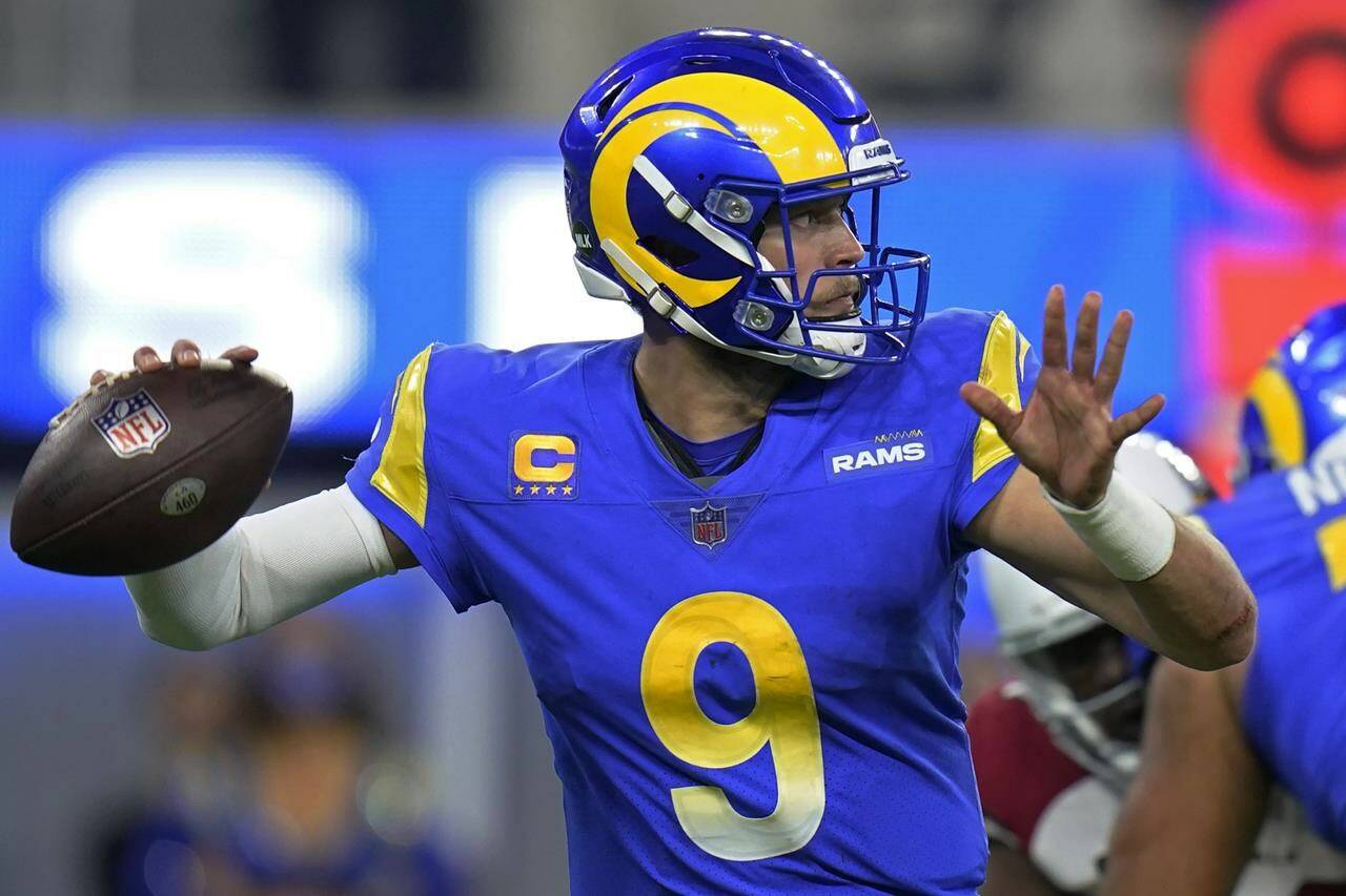 Los Angeles Rams quarterback Matthew Stafford passes the ball during a playoff football game in January. Stafford and the Rams will play in the Super Bowl game Sunday (Feb. 13) against Cincinnati Bengals. (Photo: Jae C. Hong/AP)