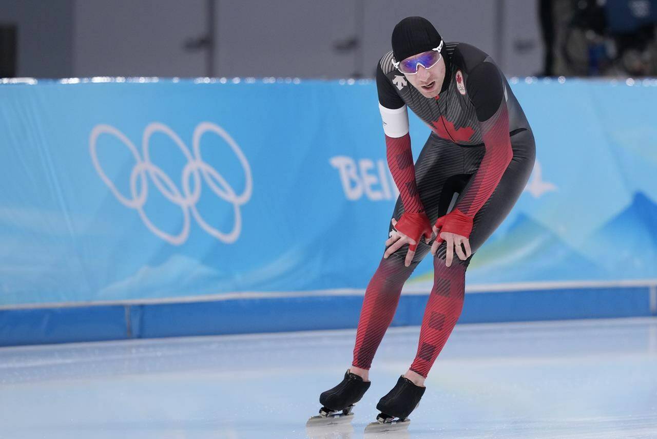 Canada’s Ted-Jan Bloemen catches his breath after competing in the men’s 10,000 metre speedskating race at the 2022 Winter Olympics in Beijing on Friday, February 11, 2022. THE CANADIAN PRESS/Paul Chiasson