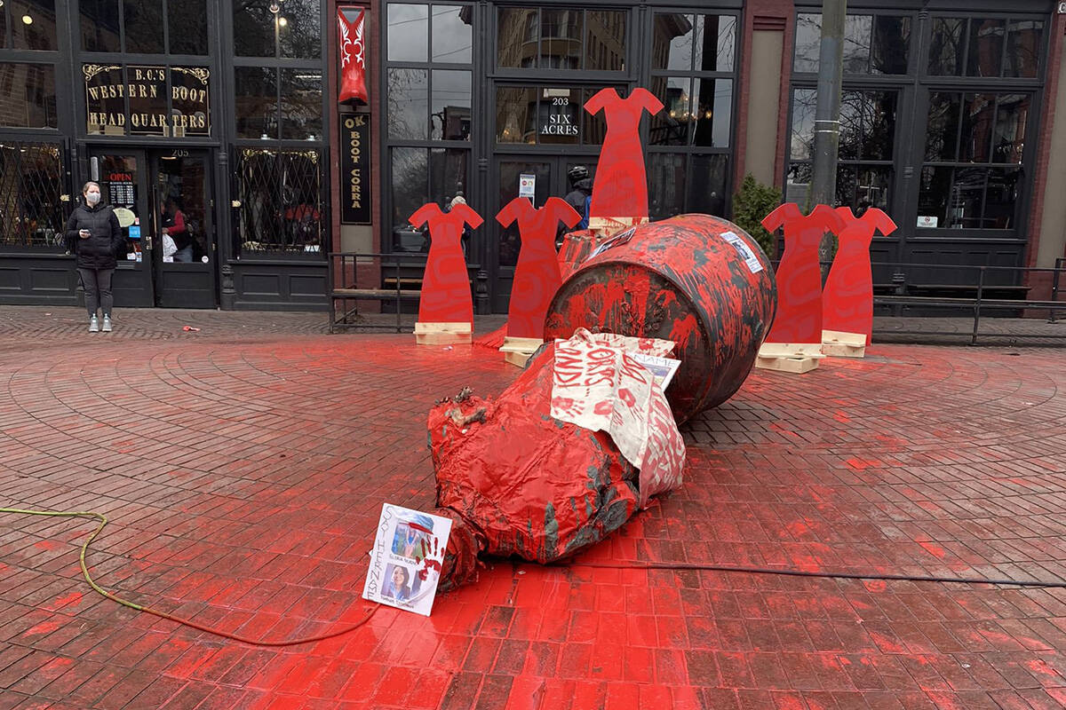 The statue of John Deighton, known as Gassy Jack, was toppled by a women’s march on Monday, Feb. 14, 2022. (cjquaschnick/Twitter)