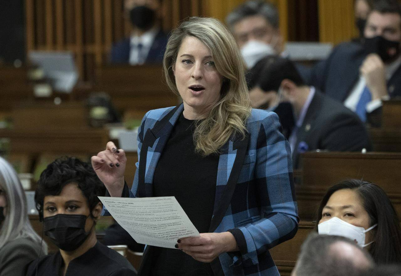 Foreign Affairs Minister Melanie Joly rises during Question Period on February 14, 2022 in Ottawa. Joly says the threat of a Russian invasion of Ukraine remains high as cyberattacks on Ukraine undermined earlier optimism Tuesday that the Kremlin might be drawing down its military forces. THE CANADIAN PRESS/Adrian Wyld