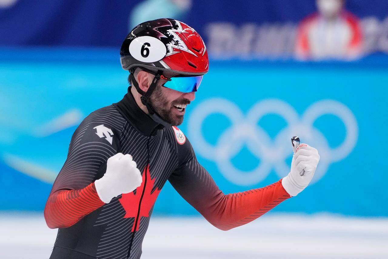 Charles Hamelin (6) of Canada after winning gold in the men’s 5,000-metre short-track speedskating relay final at the Beijing Winter Olympics in Beijing, China, on Wednesday, Feb. 16, 2022. THE CANADIAN PRESS/Paul Chiasson