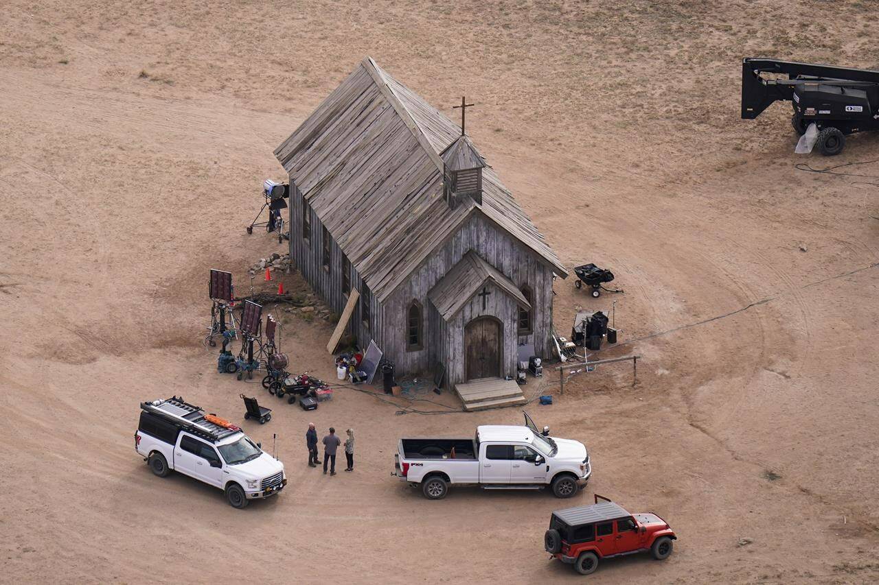 FILE - This aerial photo shows the Bonanza Creek Ranch in Santa Fe, N.M., on Oct. 23, 2021. Attorneys for the family of cinematographer Halyna Hutchins who was shot and killed on the set of the film “Rust” say they’re suing Alec Baldwin and the movie’s producers for wrongful death. (AP Photo/Jae C. Hong, File)