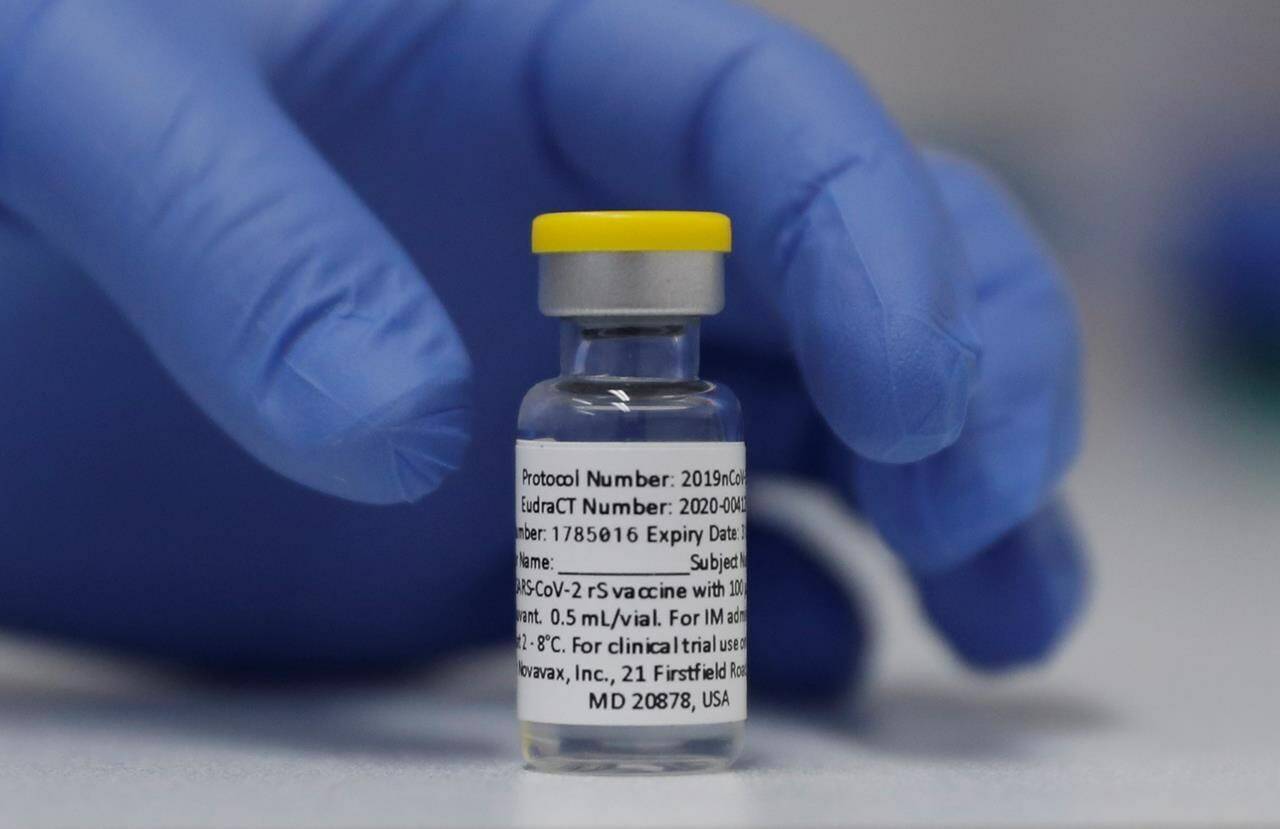 FILE - This Wednesday, Oct. 7, 2020 file photo shows a vial of the Phase 3 Novavax coronavirus vaccine ready for use in a trial at St. George’s University hospital in London. On Thursday, Aug. 5, 2021, vaccine maker Novavax announced it has asked regulators in India, Indonesia and the Philippines to allow emergency use of its COVID-19 shot. (AP Photo/Alastair Grant, File)