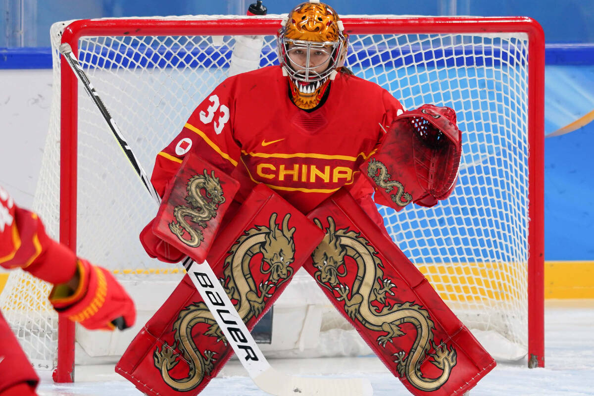 British Columbia’s Kimberly Newell, in her distinctive pads and helmet, was a star in net for Team China at the Beijing Games. Photo: Submitted