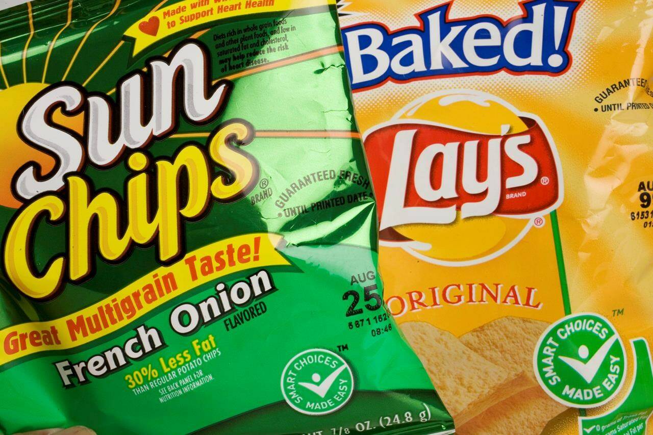 One of Canada’s biggest food manufacturers has halted shipments to one of the country’s largest grocers in a extreme example of how inflation is impacting the food industry. Bags chips from PepsiCo’s Frito-Lay division are shown in New York in this June 15, 2007, file photo.THE CANADIAN PRESS/AP-Mark Lennihan