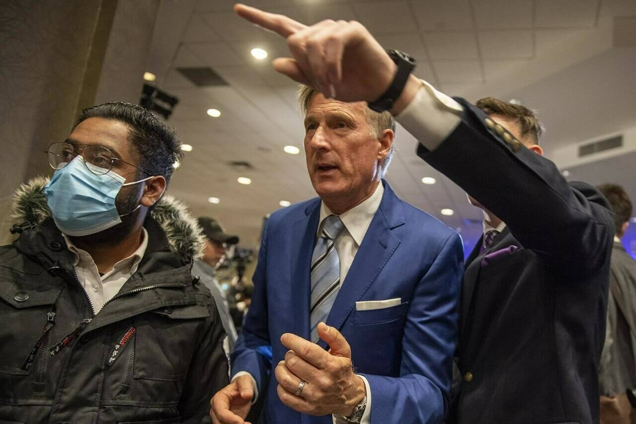People’s Party of Canada Leader Maxime Bernier leaves after speaking to supporters during the PPC headquarters election night event in Saskatoon, Sask., Monday, Sept. 20, 2021. THE CANADIAN PRESS/Liam Richards