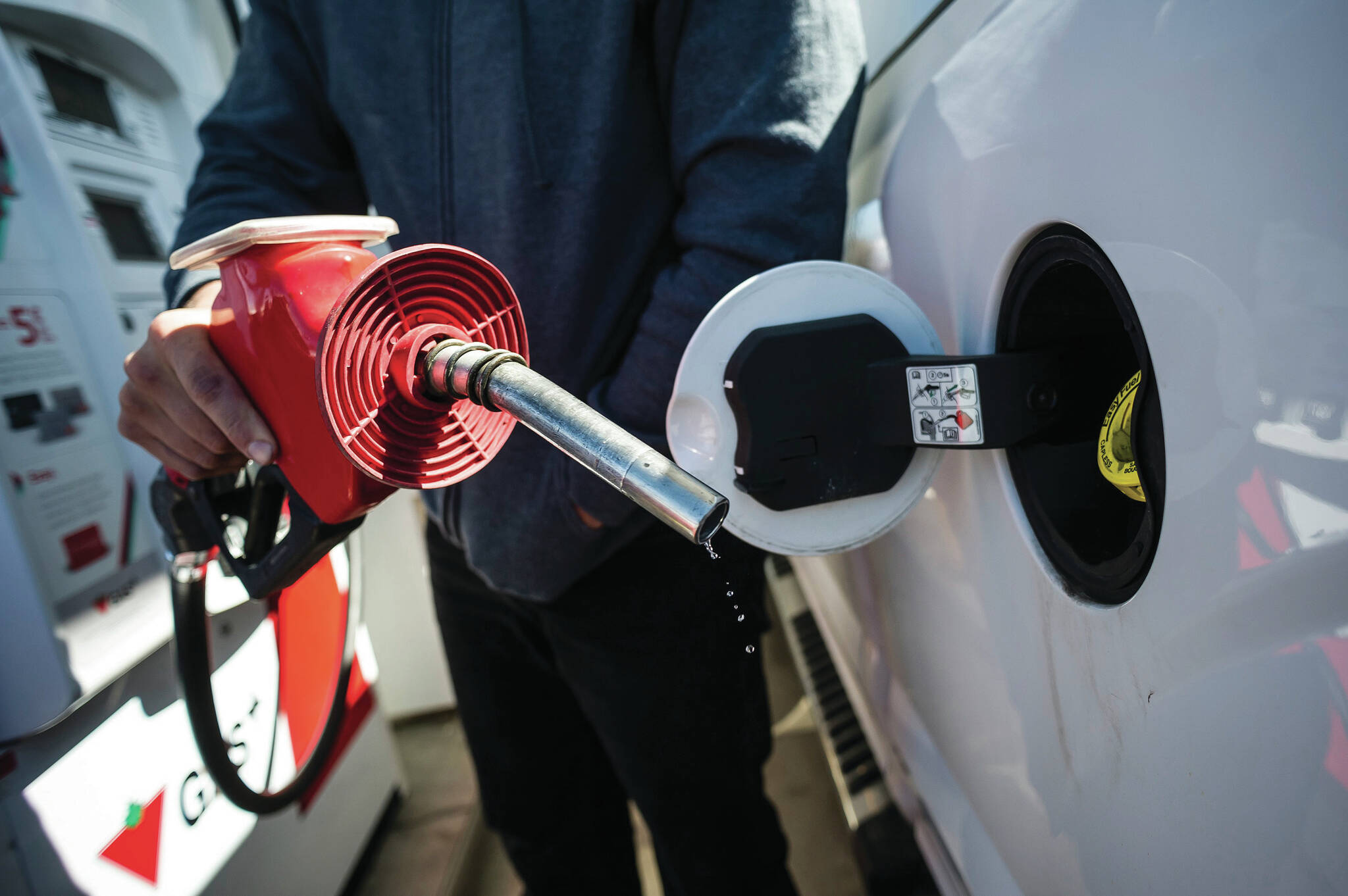 A man fills up his truck with gas in Toronto, on Monday April 1, 2019. (Photo - Christopher Katsarov)